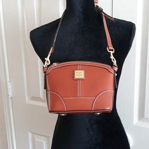 Dooney crossbody NEVER USED. Perfect size for ever